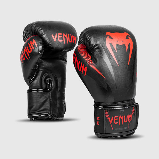 Venum Impact red boxing gloves